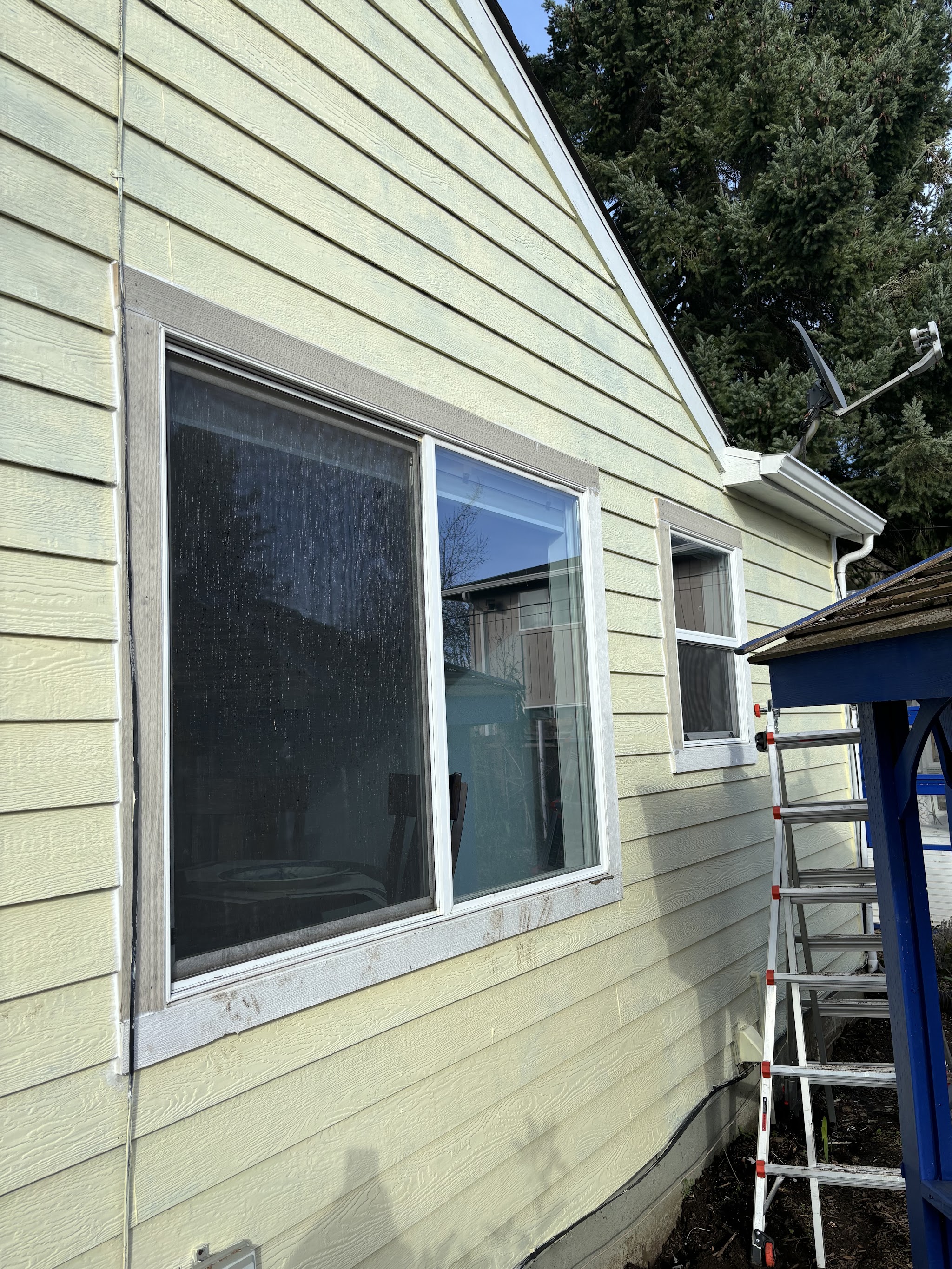 Window trim work on a home exterior in Monmouth