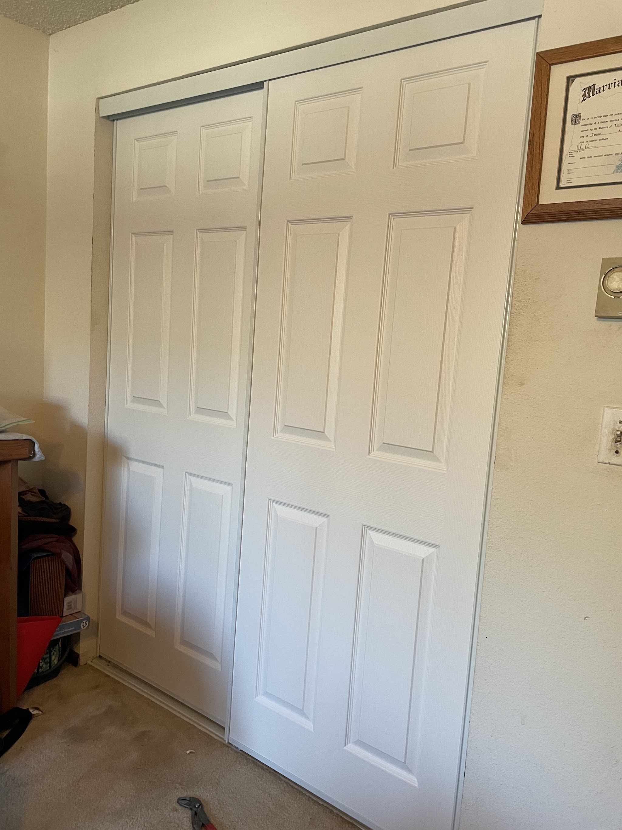 Closet door installation in a Monmouth home